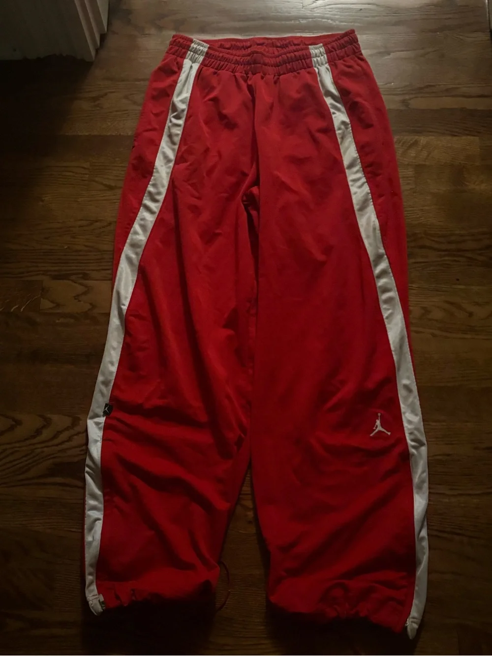Jordan Red baggy Sweatpants with White Side Stripes and embroidered jumpman